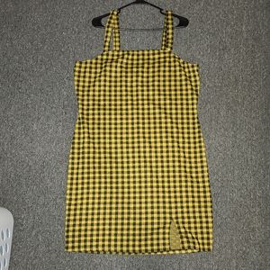 Yellow fitted dress.